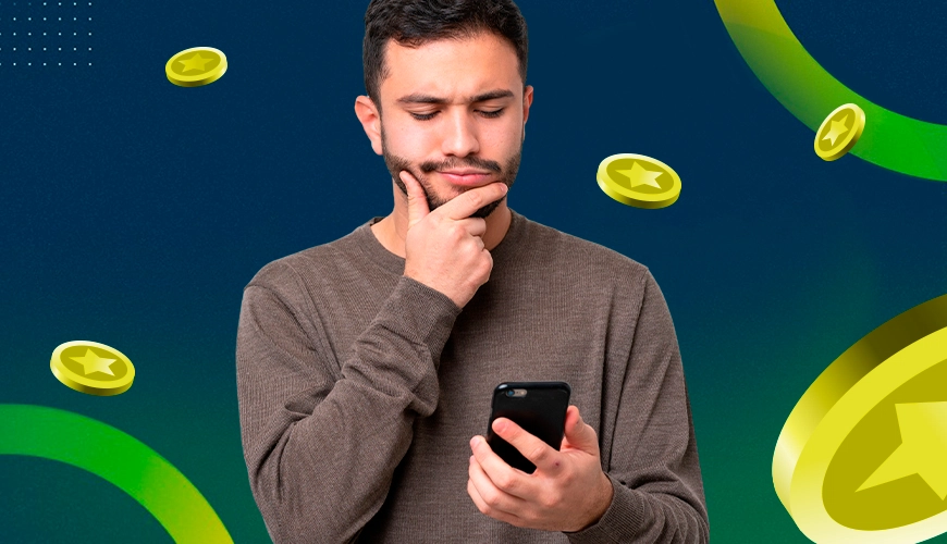 La imagen muestra a un hombre pensando mientras usa un smartphone