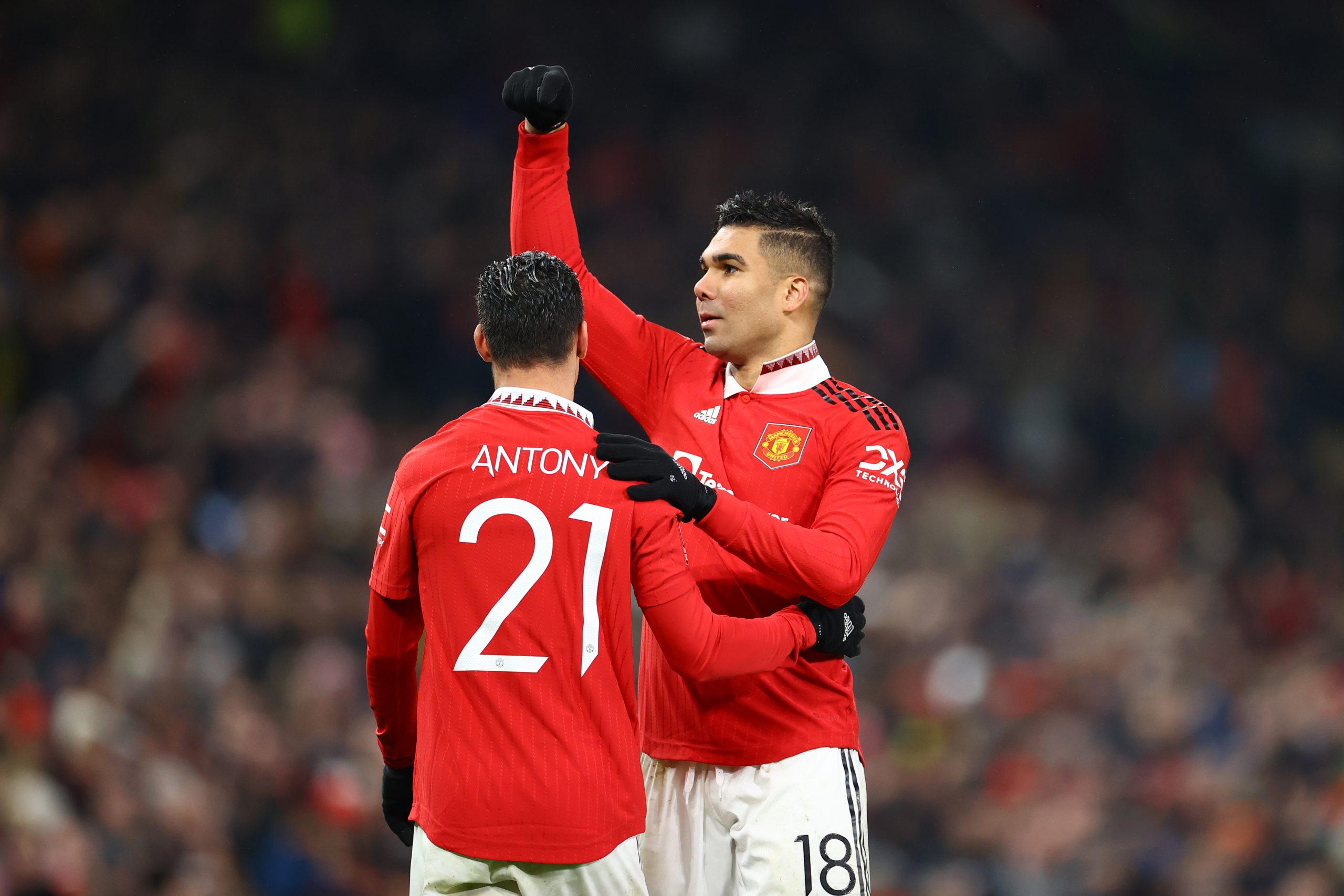MANCHESTER, ENGLAND - JANUARY 28: Casemiro of Manchester United celebrates with teammate Antony after scoring the team's first goal during the Emirates FA Cup Fourth Round match between Manchester United and Reading at Old Trafford on January 28, 2023 in Manchester, England. (Photo by Michael Steele/Getty Images)